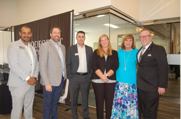 (From  left): Pictured from Woodforest National Bank are (Jose Acosta,  Assistant VP, Market Manager); Jeremy Horton (Vice President); Josh  Fowler, Assistant VP, Market Manager - Retail; Rebecca McDonald, VP,  Regional Retail Manager; Linda O’Dell, Downtown Conroe Branch Manager;  and Mike White, Divisional Manager, Sr. VP – Retail. (Photo by Liz  Grimm)